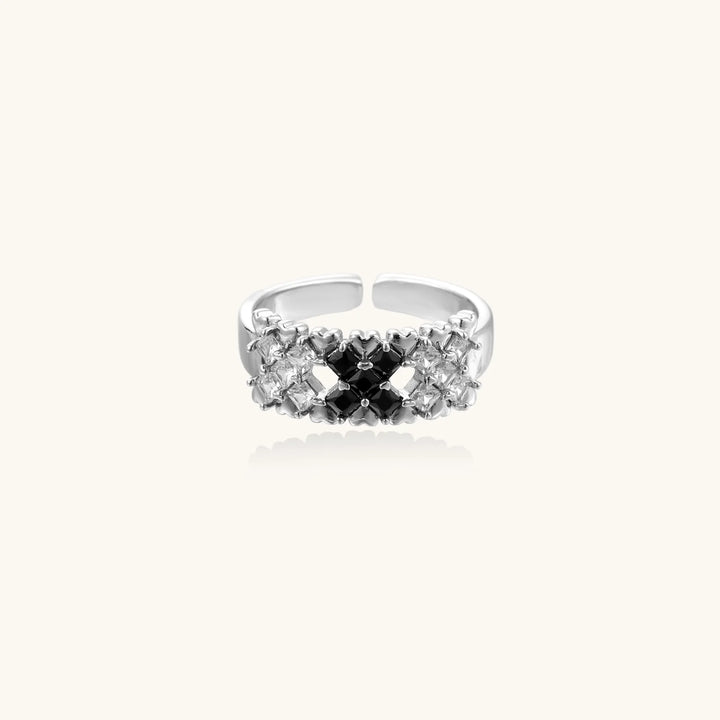 White gold plated adjustable ring with three rows of square zirconia stones in black or pink chevron pattern