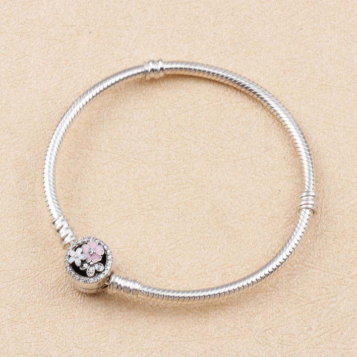S925 sterling silver fashion personality European and American bracelets Magnolia snake bone chain free DIY beaded pendant sterling silver jewelry.