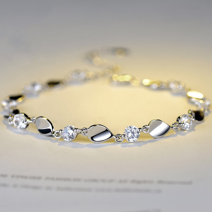 Diamond-encrusted 925 sterling silver bracelet.
