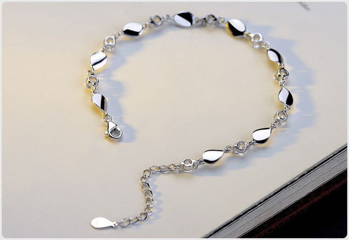 Diamond-encrusted 925 sterling silver bracelet.