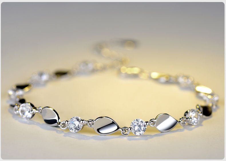 Diamond-encrusted 925 sterling silver bracelet.