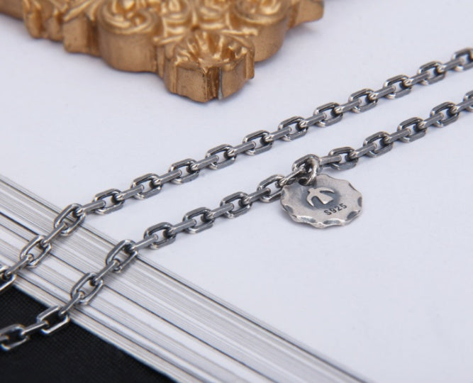 Detail of angled chain links on Morgan Blade 925 silver necklace